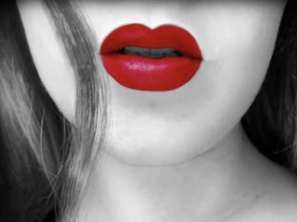 Top half of the book cover for Sirens by Chloe Ruffennach. Photo is in black and white and features the lower half of a woman's face with her lipstick being a bright red pop of color